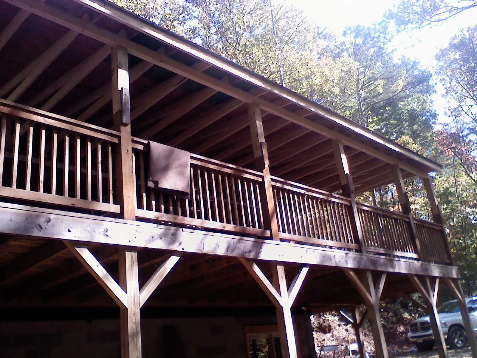 Timber framing under a new elevated porch and deck — Roof Leak Repair in Albuquerque by Roofing Brothers